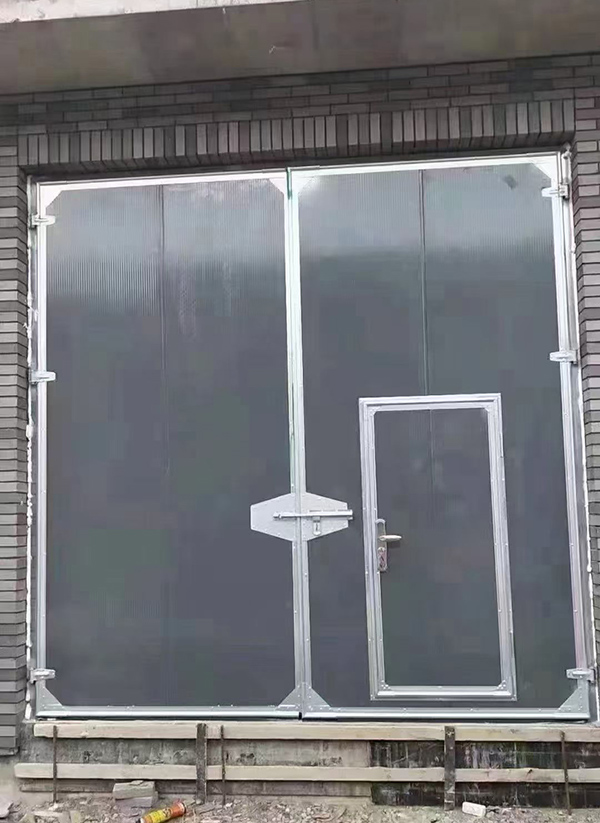 彬县工业平开门在大型设备制造车间的应用实例